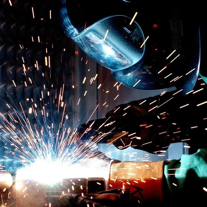 Person welding in the GTA West Economic Gateway