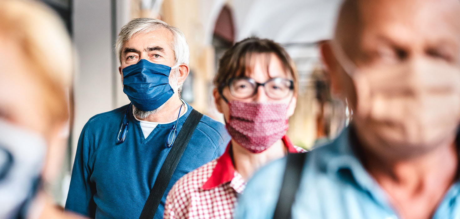 Masked people in a crowd