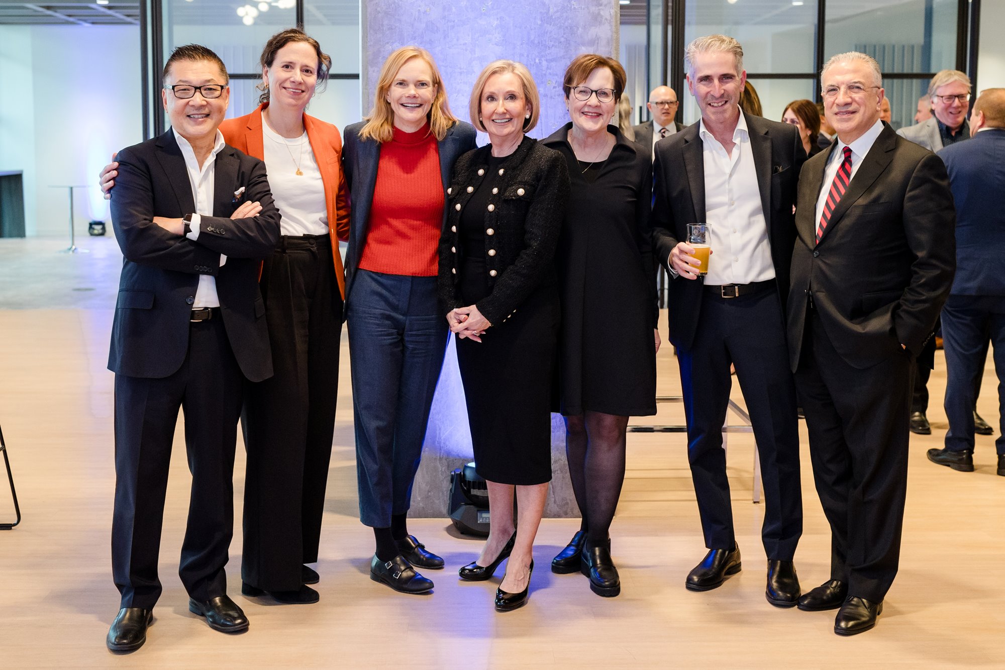 Jan De Silva, former TRBOT President & CEO, with Yung Wu and supporters.