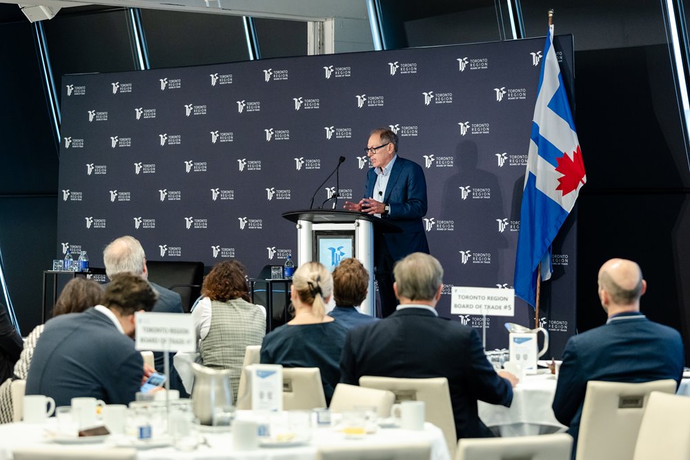 Giles Gherson, President & CEO of TRBOT addressing a crowd at a recent event.