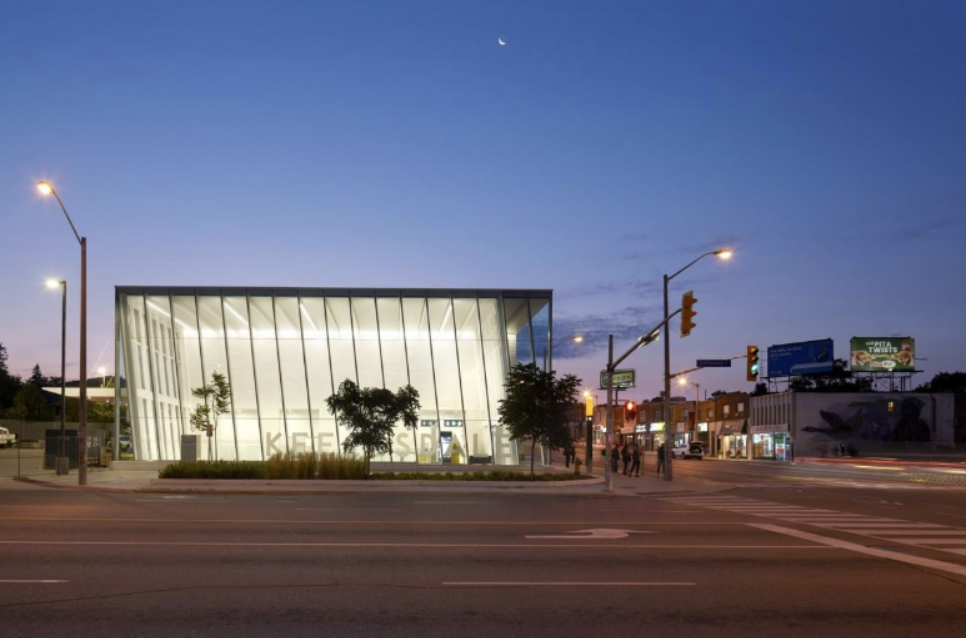 The transparent station facades maximize daylight, improve visibility, and create inviting public spaces. Credit A-Frame.  
