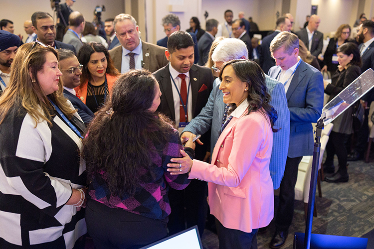 Anita Anand greets attendees