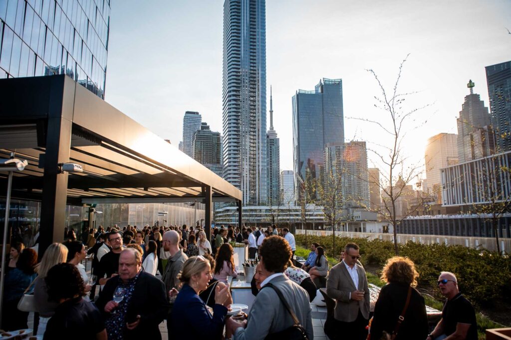 100QQE terrace event with many guests