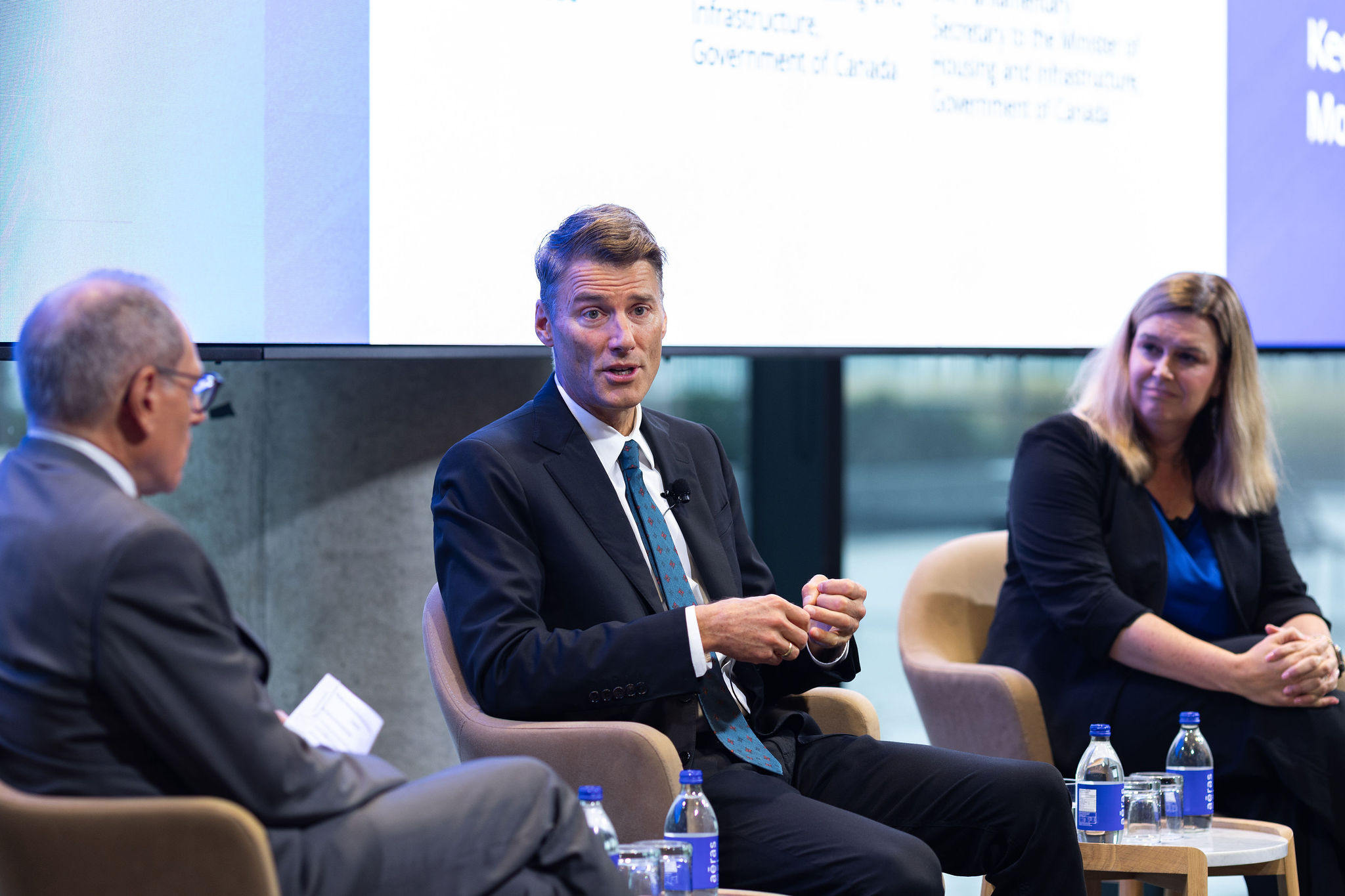 Giles speaking at the forum