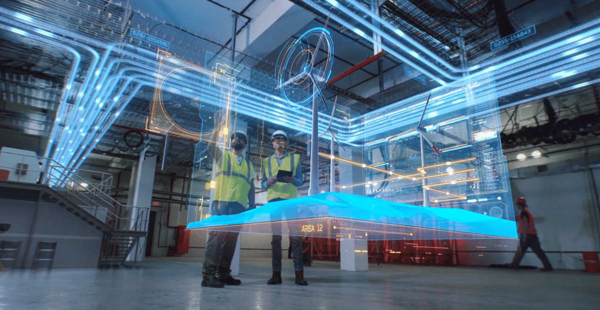 Two engineers working on an AR overlay.