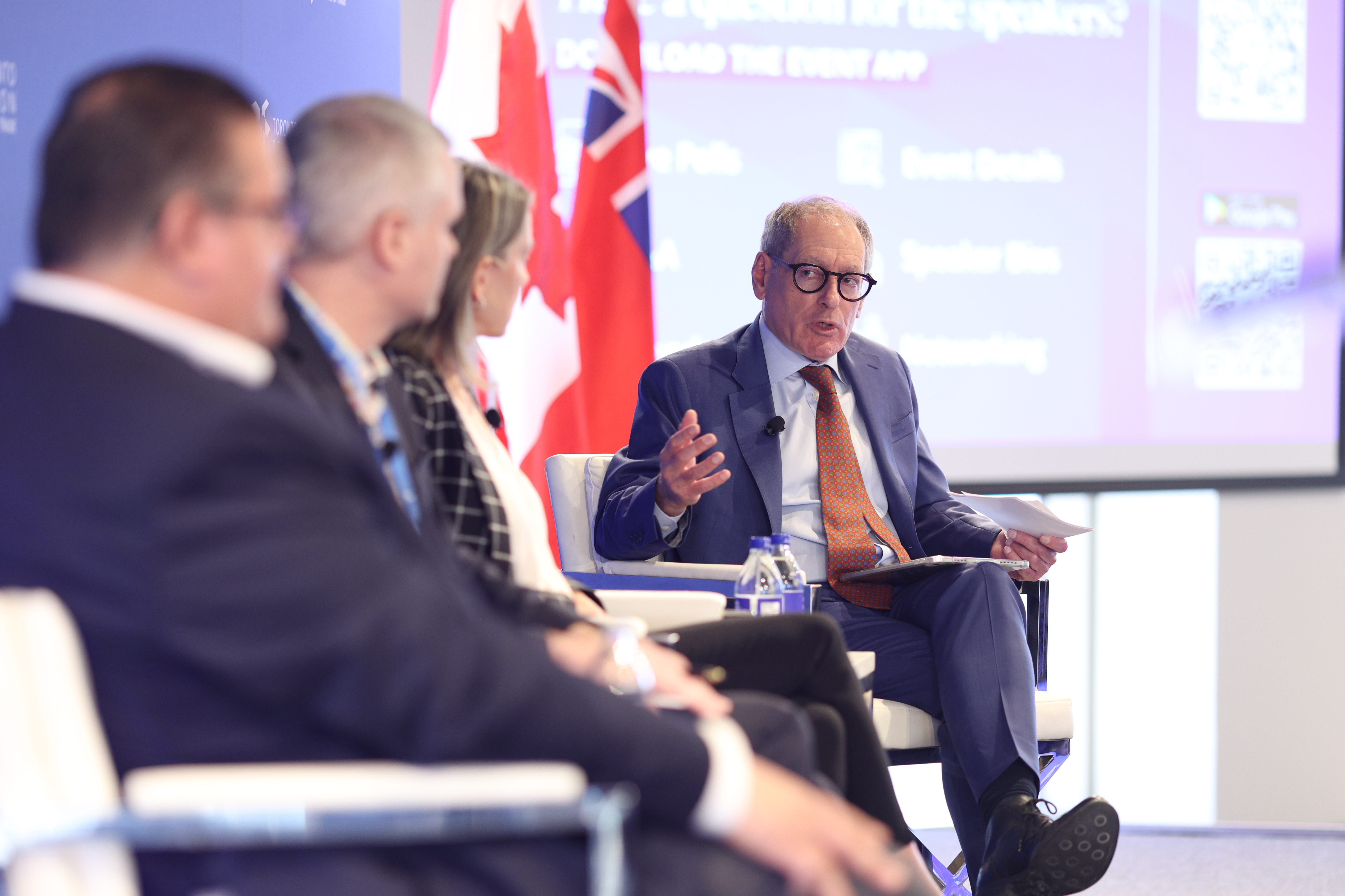 Giles speaking at the forum