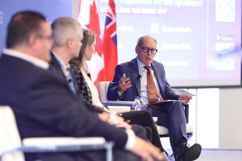 Giles speaking at the forum