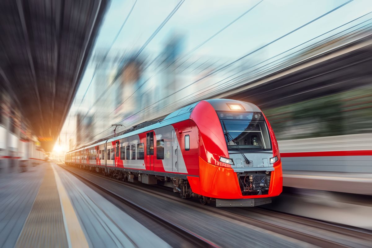 A VIA-HFR Train roaring through the station.