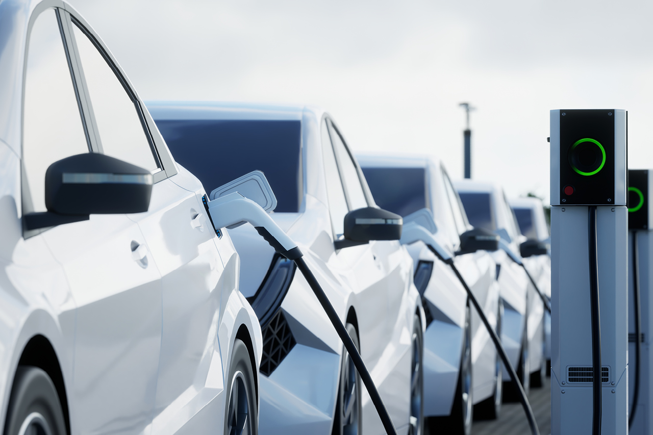A fleet of electric vehicles being charged.