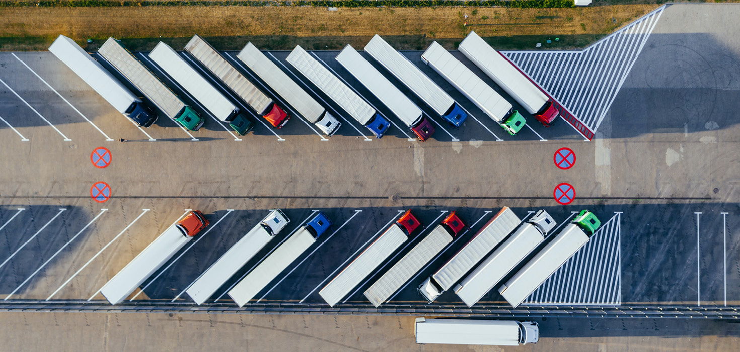 Aerial view of parked shipping trucks.