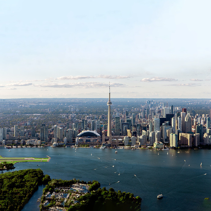 Distant view of Toronto from above lake Ontario.