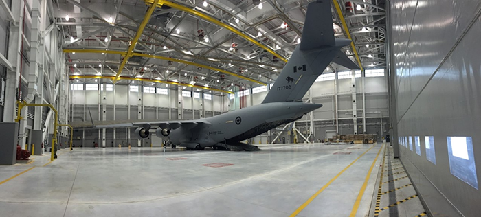 A defence jet in a hangar