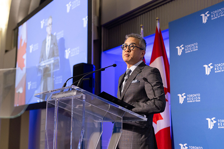 Joseph Wong speaks at a podium