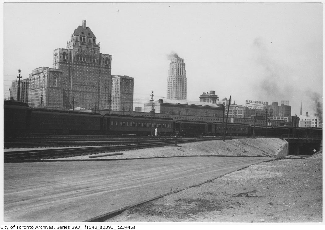 A shot of the GO Train south of the Royal York building.