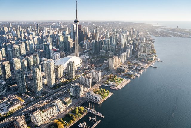 A photo of Toronto's waterfront, with a blue creative overlay.