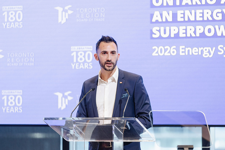 A man speaking at a podium
