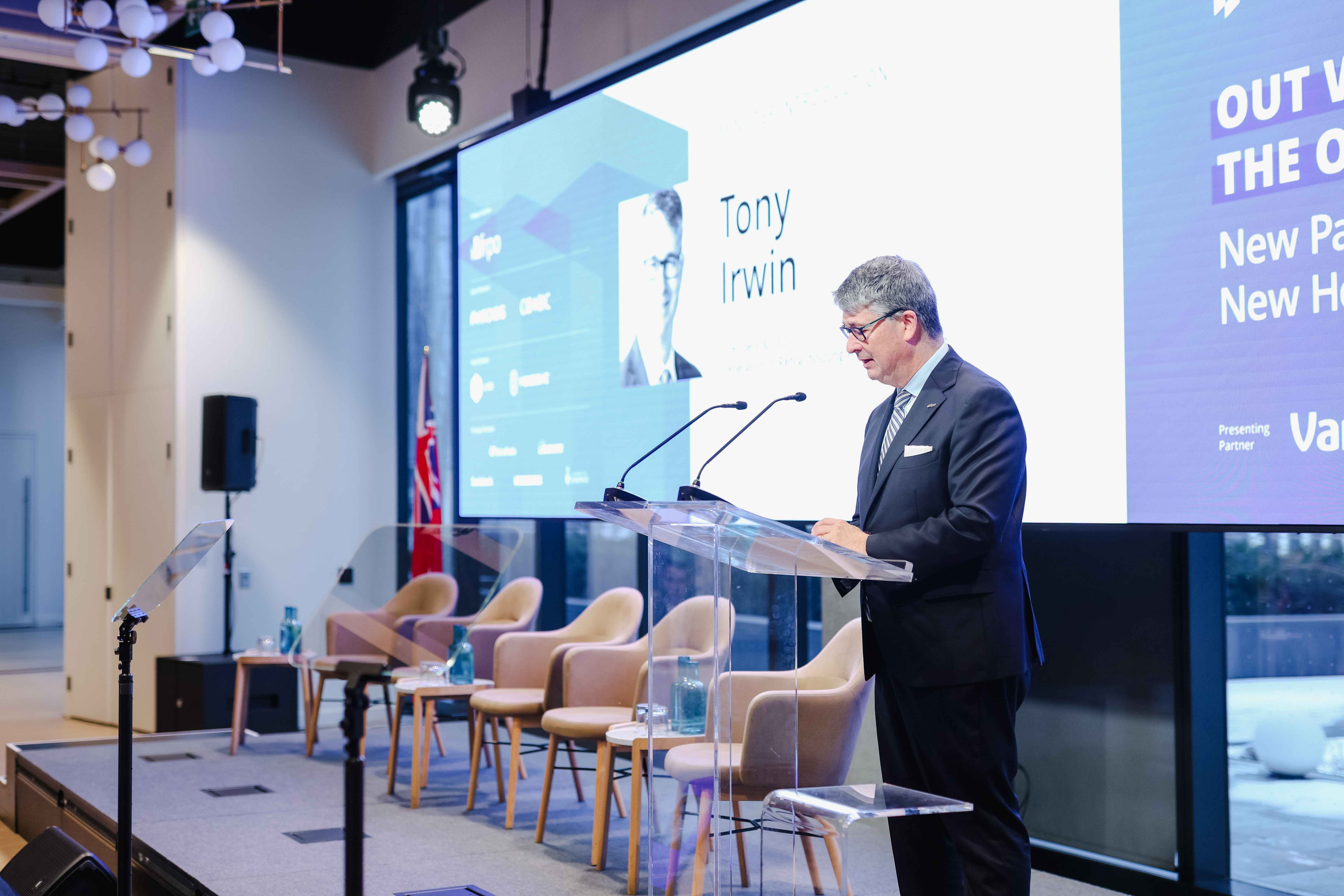 A man speaking at a podium
