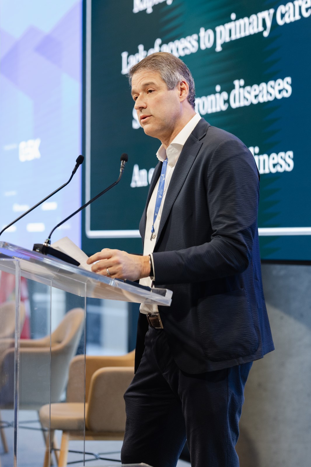 A man speaking at a podium
