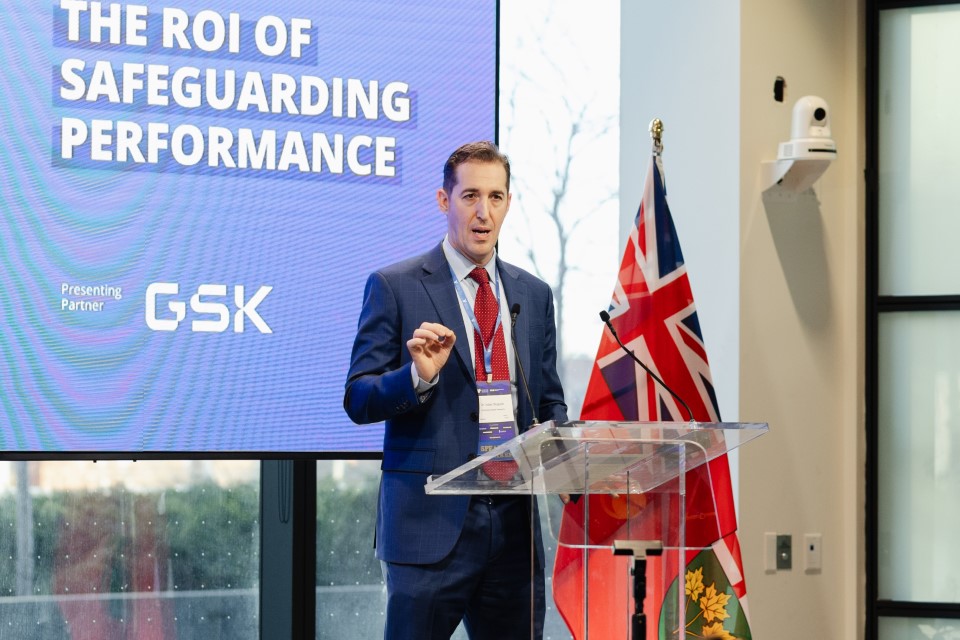 A man speaking at a podium